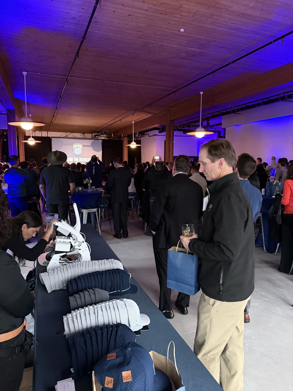 Merch Troop live printing — presses rolling at the event